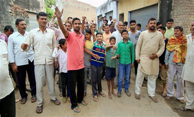 Villagers shout slogans during a protest over firing from the Pakistan side, at Mawa village in Samba district. (Photo: AP) Villagers shout slogans during a protest over firing from the Pakistan side, at Mawa village in Samba district. (Photo: AP)